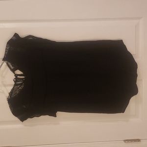 Black blouse. Size large. Never worn